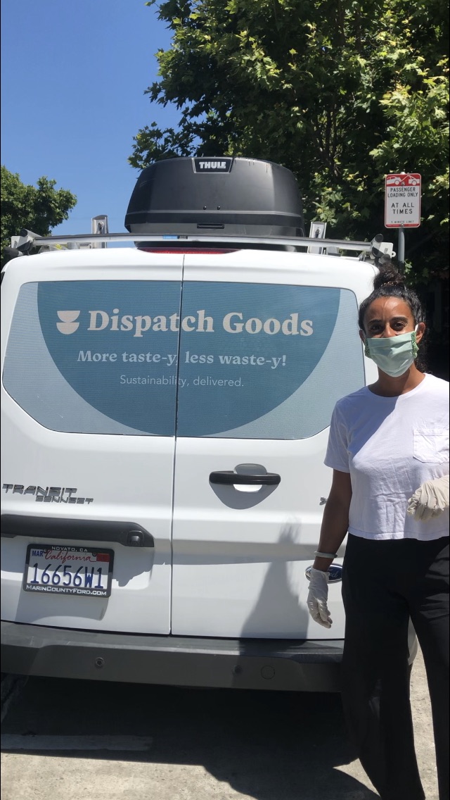 Founding team member driving delivery truck.