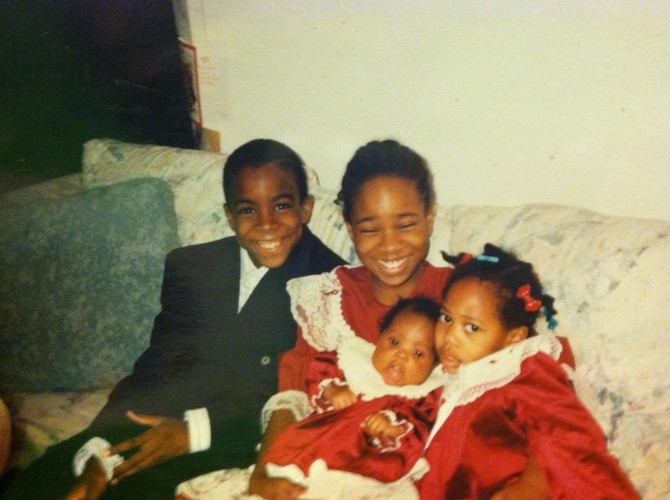 Erika with family as a child