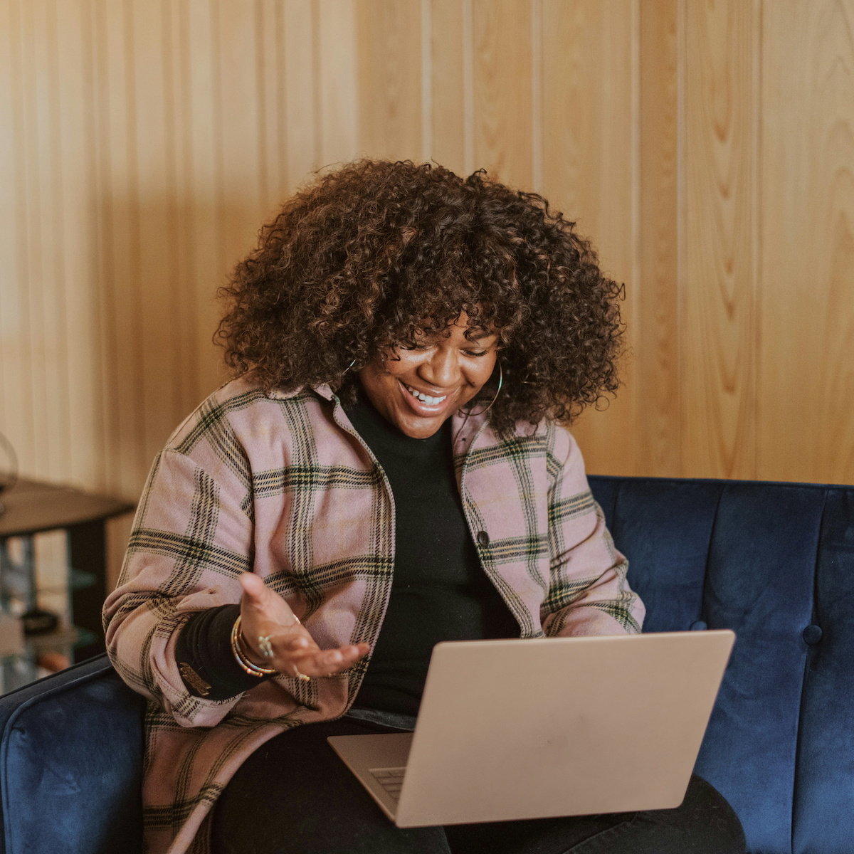 Women talking on laptop.